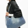 Große Denim-Charms-Tasche