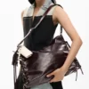 Große glänzende gewebte Tasche