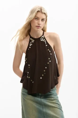 Halterbluse mit Applikationen