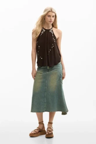 Halterbluse mit Applikationen