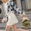 Häkel-Pullover mit Blumen Häkel-Pullover mit Blumen