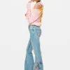 Jeans-Hose mit Blumen-Ziernähten
