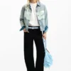Jeansjacke mit Aufnähern
