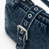 Kleine Denim-Umhängetasche mit Applikationen