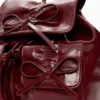 Kleine glänzende Rucksackschleife Kleine glänzende Rucksackschleife