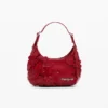 Kleine glänzende Tasche mit Blumen-Applikationen