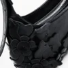 Kleine Tasche mit Blumen-Applikationen Kleine Tasche mit Blumen-Applikationen