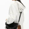 Kleine Tasche mit Prägung Kleine Tasche mit Prägung