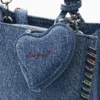 Kleiner Denim-Rucksack mit Herz Kleiner Denim-Rucksack mit Herz