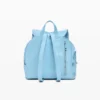 Kleiner glänzender Rucksack mit Schleife Kleiner glänzender Rucksack mit Schleife