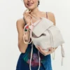 Kleiner Rucksack mit Anhängern Kleiner Rucksack mit Anhängern
