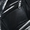 Kleiner Rucksack mit Schnallen Kleiner Rucksack mit Schnallen