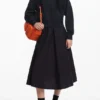 Kombiniertes einfarbiges Kleid Kombiniertes einfarbiges Kleid