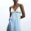 Langes Jeans-Kleid mit Trägern Langes Jeans-Kleid mit Trägern