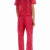 Maßgeschneiderte Hose aus floraler Spitze