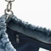 Mittlere ovale Tasche mit Anhängern Mittlere ovale Tasche mit Anhängern