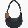 Mittlere ovale Tasche mit Prägung Mittlere ovale Tasche mit Prägung