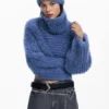 Set aus kurz geschnittenem Pullover und Mütze Set aus kurz geschnittenem Pullover und Mütze