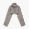 Set aus kurz geschnittenem Pullover und Mütze Set aus kurz geschnittenem Pullover und Mütze