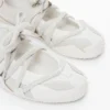 Sneaker aus naturbelassenem Stoff