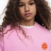 Sweatshirt mit gestickter Sonne Sweatshirt mit gestickter Sonne