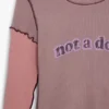 T-Shirt „Not a Doll“ T-Shirt „Not a Doll“