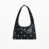 Tasche aus Kunstleder mit Nieten