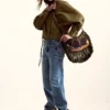 Tasche mit Fransen, entworfen von Christian Lacroix