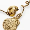 Unregelmäßige goldene Muschelohrringe Zalio