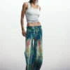 Weit geschnittene Splatter-Jeans
