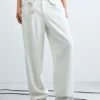 Weite Hose mit Knöpfen Weite Hose mit Knöpfen